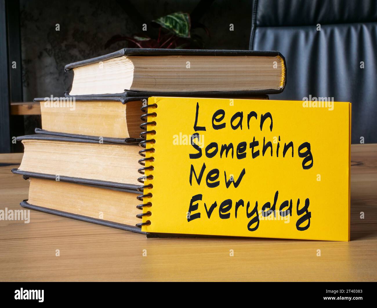 "Bold typography reading 'Create Something New' set against a vibrant, abstract background."​